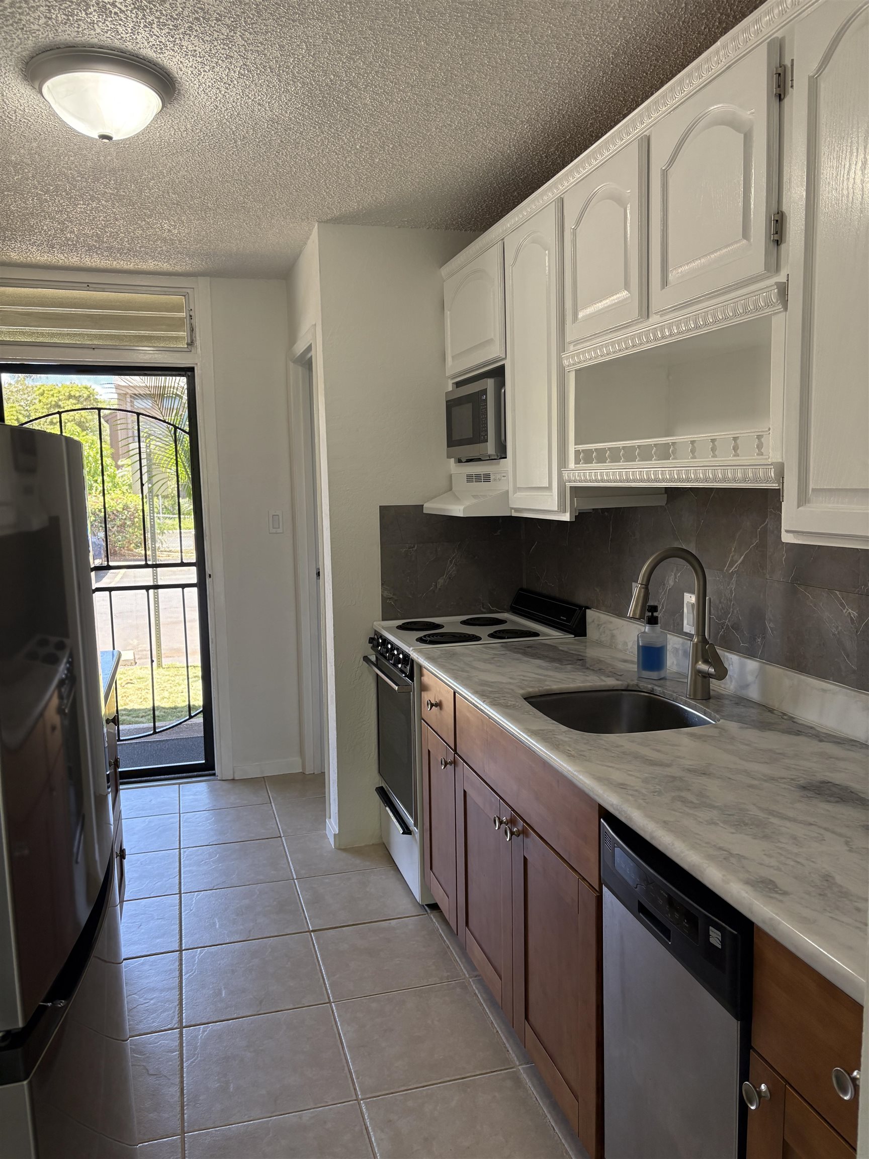 Kihei Bay Surf condo # D143, Kihei, Hawaii - photo 2 of 23